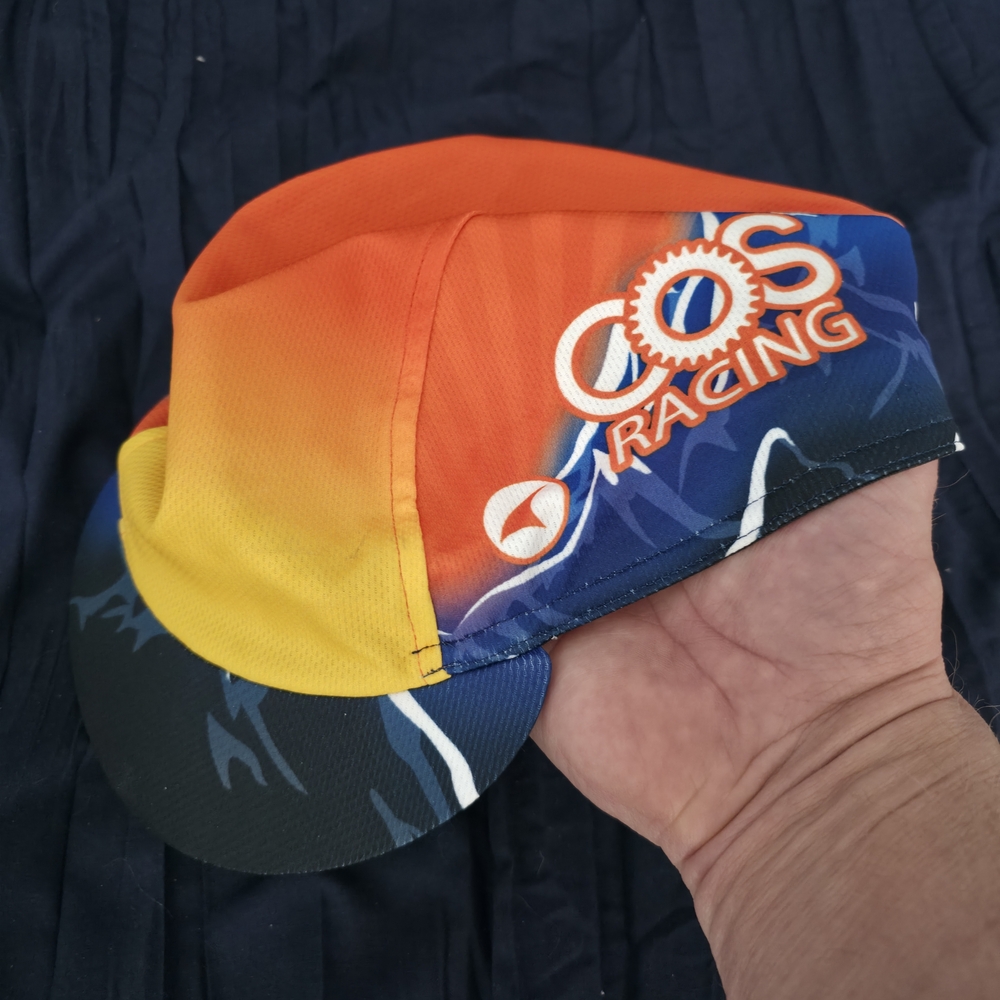 Pactimo Custom 2025 COS Racing Cycling Cap in Orange, Yellow & Blue